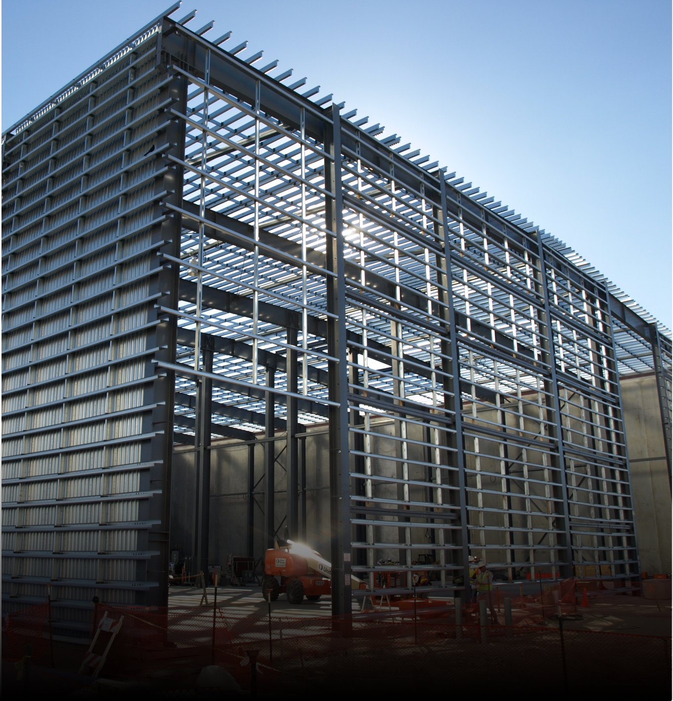 Construction view of steel frame industrial building designed in Texas by commercial contractors